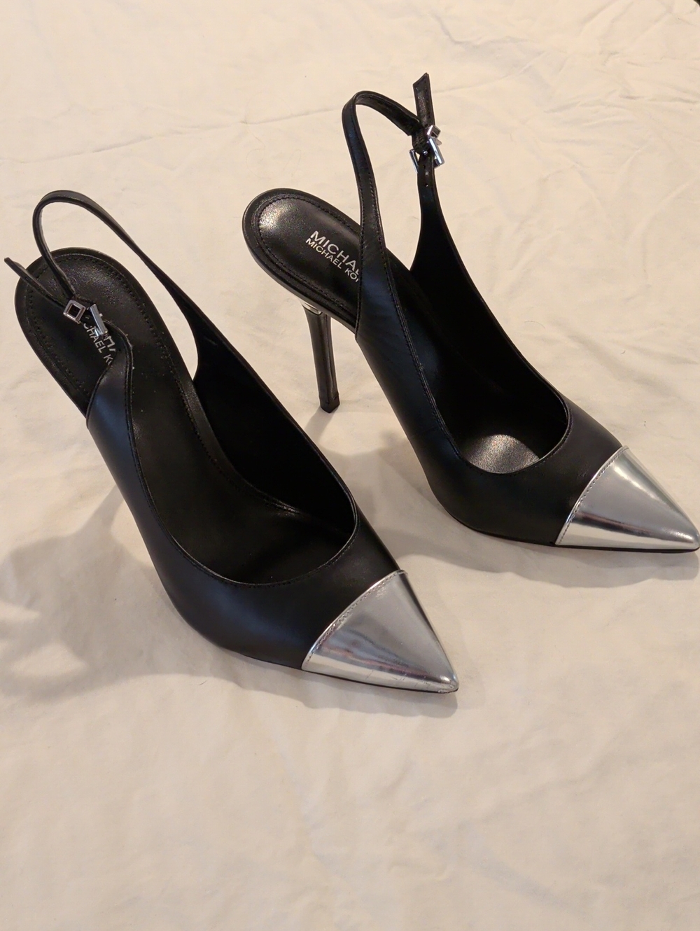 MICHAEL Michael Kors Black Slingback Pumps with Silver Cap Toe
